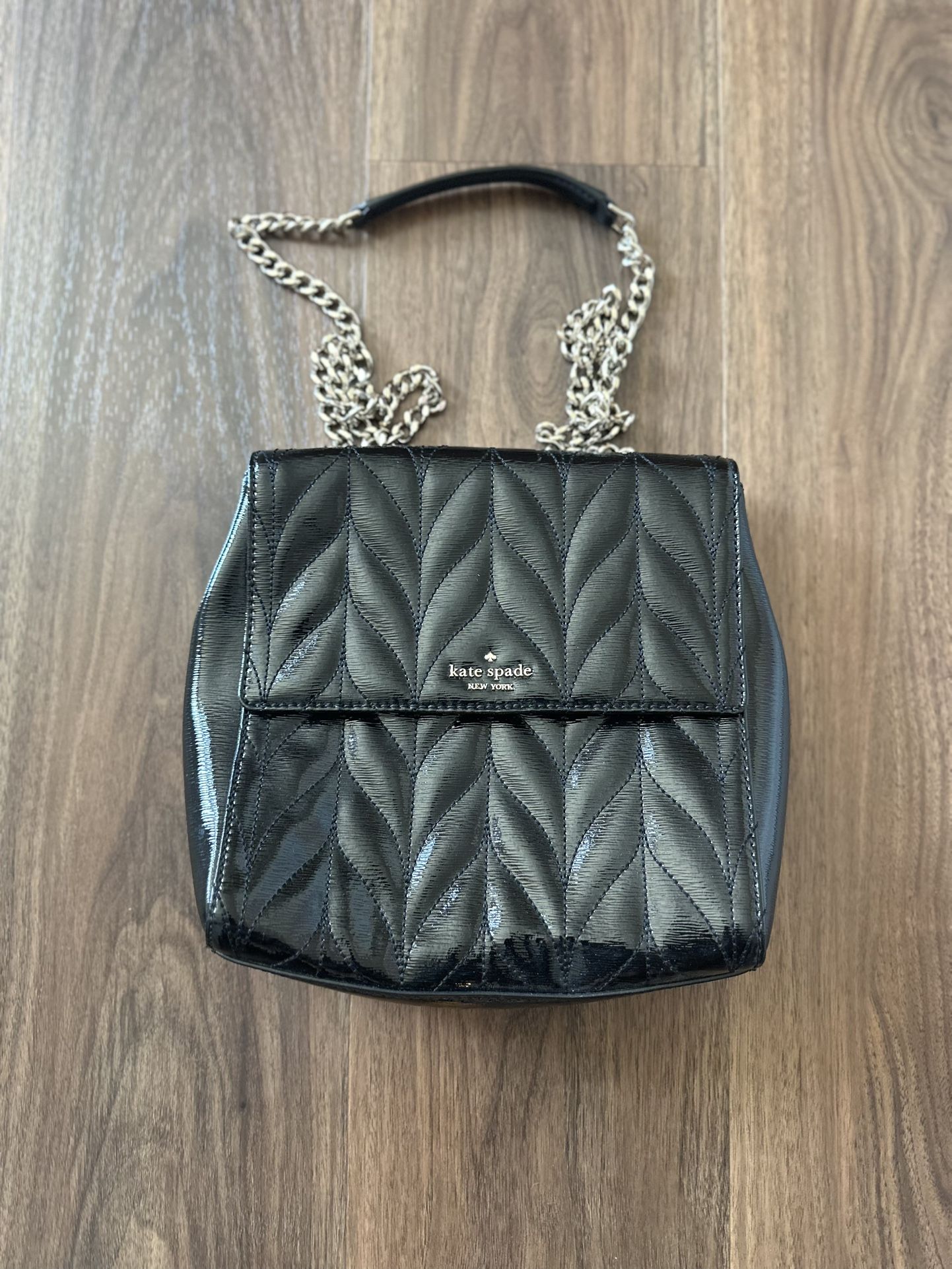 Kate Spade New York black patent leather backpack