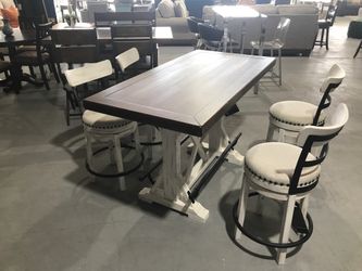 Rustic counter height table with 4 swivel chairs