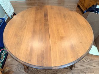 Round Wood Dining Table with Turned Legs