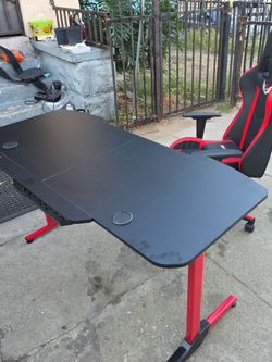 Gaming chair and desk sold as set