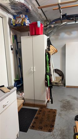 Tall White Storage Cabinet with Doors