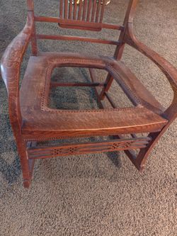 Antique oak rocking chair very old heavy, perfect. Just need seat. I believe you restrain it with leather