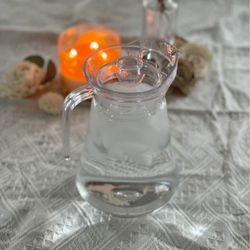 13 Clear Plastic Water pitchers 