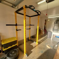 Squat Rack w/ Barbell and Plates