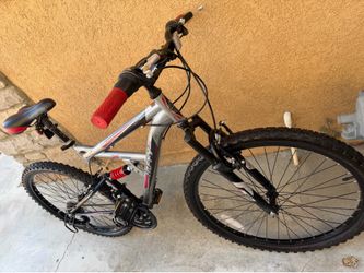 Huffy Kolo dual-suspension mountain bike featuring a 26-inch frame.