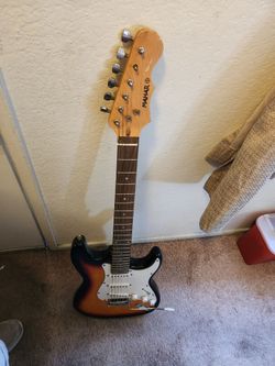 MAHARR , ELECTRIC  GUITAR,  MISING  ONE STRING.