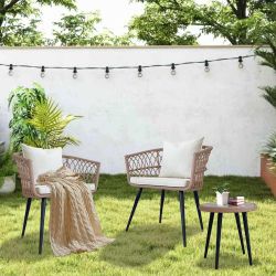 Brand new pair of Morden Rattan chairs and matching side table
