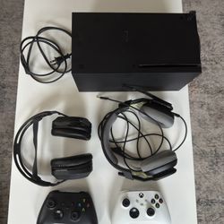 XBOX Series X with accessories and controllers.  