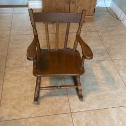 A little child’s rocking chair