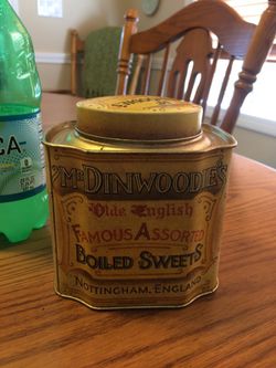 Mr. Dinwoodie's collectors tin container