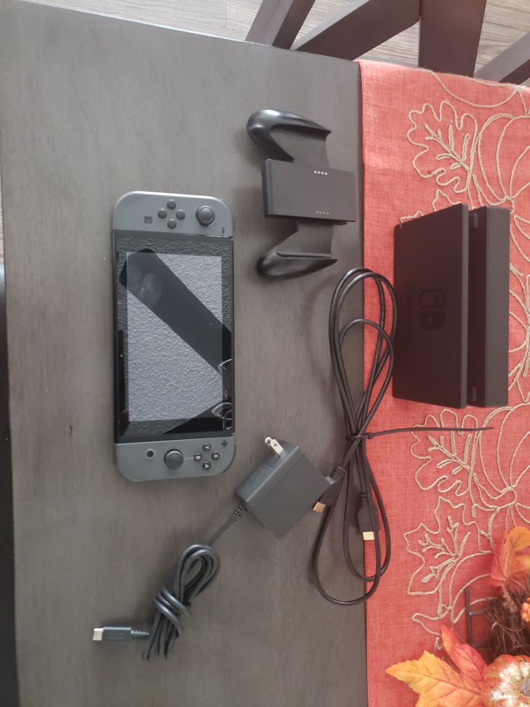 Nintendo Switch Condition is very good just has a couple very lite scratches on back, tested, comes with everything in picture.