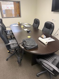 Office desk and conference room.
