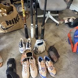 Baseball Gloves, Bats And Cleats 