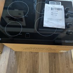 GE 30 In. 4 Burner Element Radiant Electric Cooktop W/ 2 Power Boil Burners.