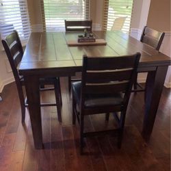 Table And 7 Chairs