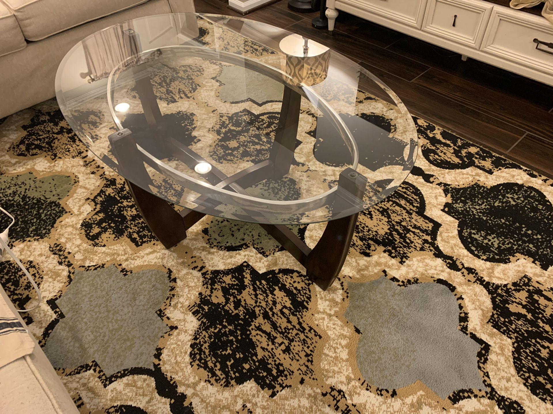 Oval glass top coffee table with 2 matching end tables