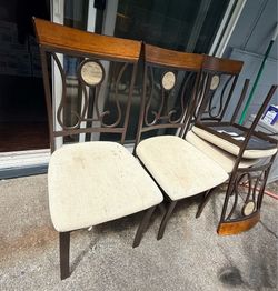 Free - four matching metal and wood dining chairs - sturdy!