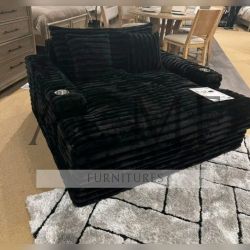 Black jumbo corduroy single sofa chaise with cup holders 