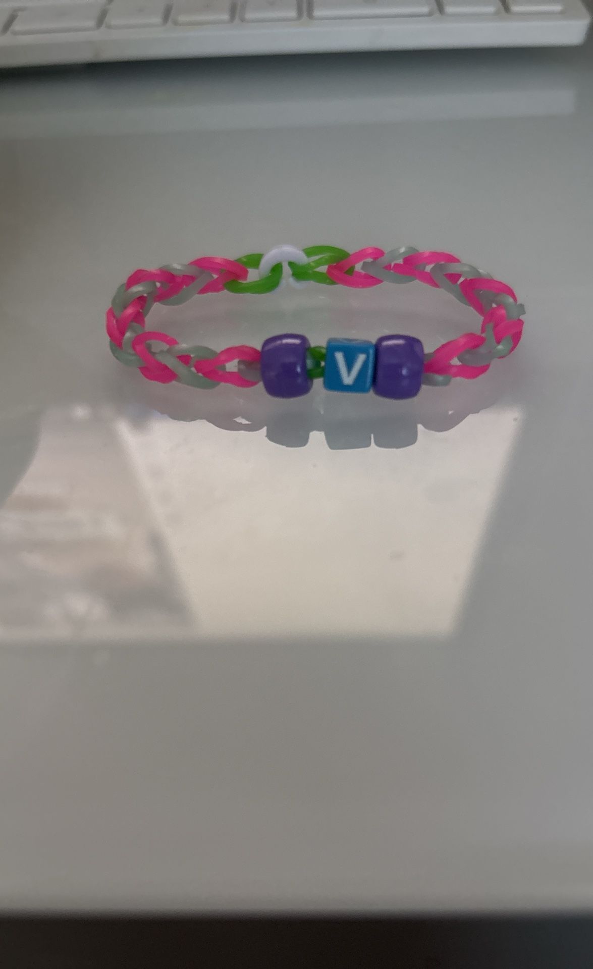 A Bracelet That Starts With V It Is Green Lavander Blue Pink