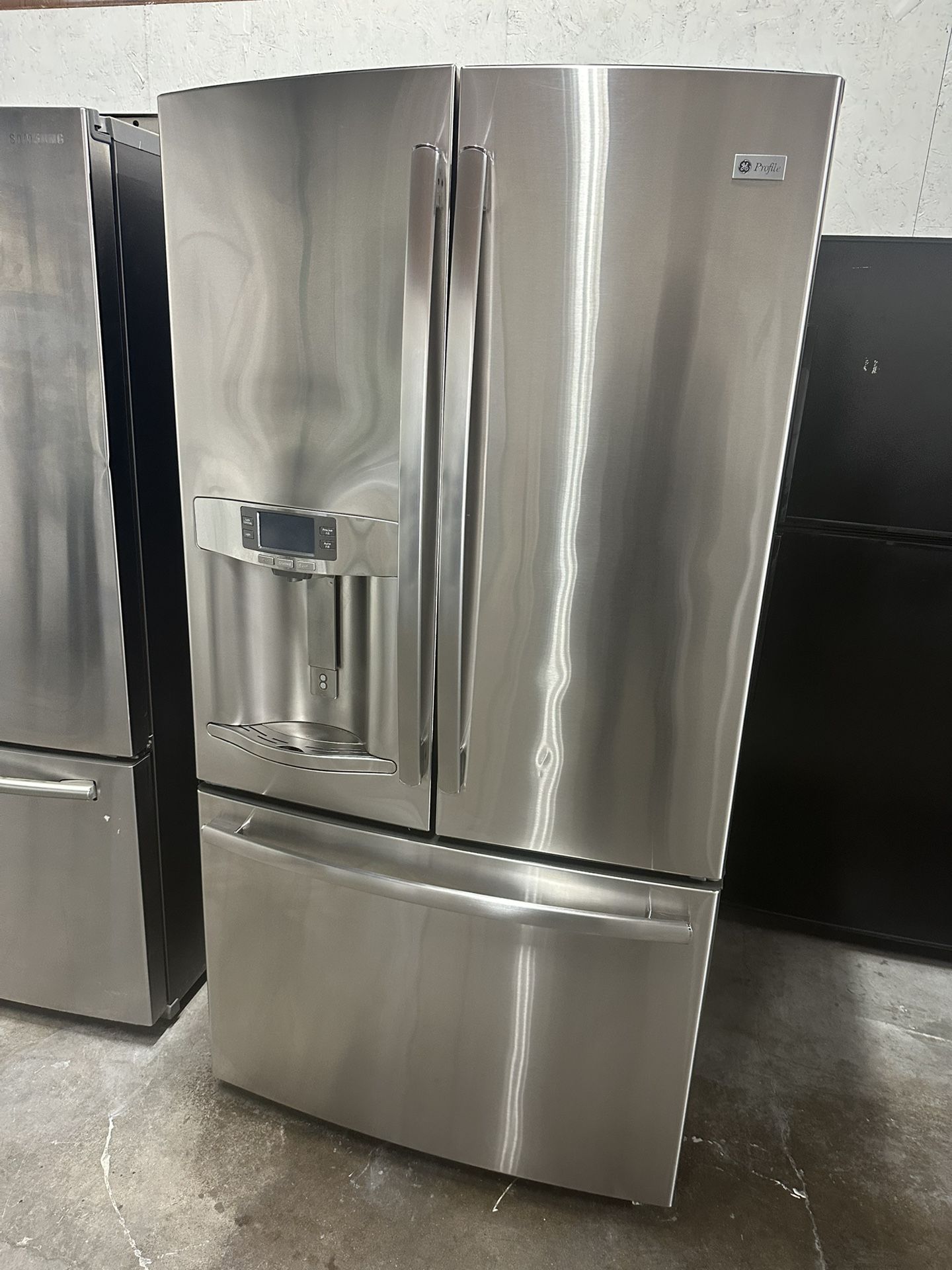 GE Profile⢠Series 28.6 Cu. Ft. French-Door Refrigerator can deliver Retail price $3199