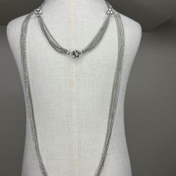 Crystal rhinestone and silver chain double layer necklace.   Perfect condition. Each strand contains five chains, and there are three rhinestone balls