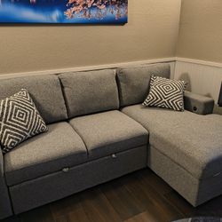 Gray Loveseat With chaise Lounge (Converts To Full Size Bed)