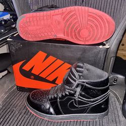 Jordan 1 Mid Blacks and red