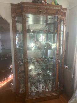 Wood and Glass Curio Display Cabinet and dining table with chairs
