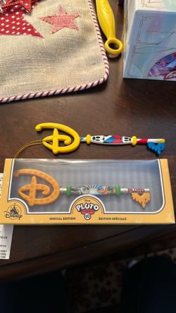 D23 Disney store key and Pluto key