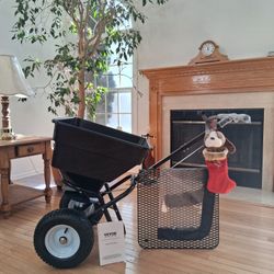 BRAND NEW Spreader (SALT & Fertilizer) -  100 LB, 10" Wheel