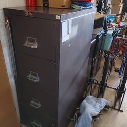 All items are make reasonable offer. 

Bike Rack with trailer hitch, with spring wheel tie downs -  best offer

Solid Lead Fireproof 4 Drawer File Cab