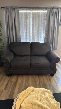 Leather loveseat dark gray