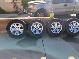 Set of 4 Chevy OEM Wheels with Tires