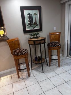 Wicker bistro table. Two chairs. Great condition