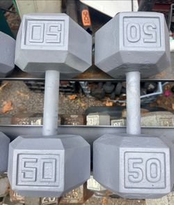 PAIR  OF  50 LB.  STEEL  HEX  DUMBBELLS