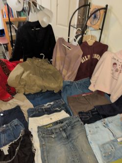 Aprox 40 women's new or vintage clothing lots of jeans shorts sweaters hoodies coats activewear dresses and much much more