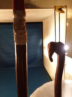 Wood carved walking sticks