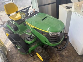 New John Deere Riding Lawn Mower.$2500. Can Deliver For A Fee