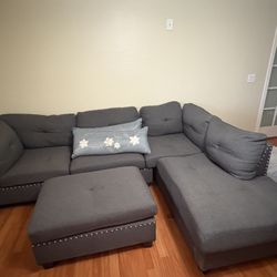 grey sectional and ottoman 