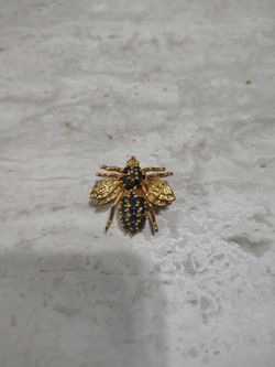 Gold Tone Bee Brooch with Dark Stones
