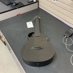 Composite Acoustics Cargo Carbon Fiber Travel Guitar.