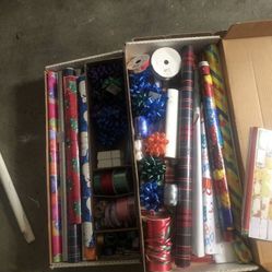 4 Sets Of Gift wrapping papers and bows/ribbons 