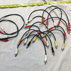 RCA cable jumpers. 15 of different lengths 3 to 12 inches. 1 is 3 feet