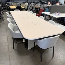 12’feet x 4’feet conference table, seats up to 10 people