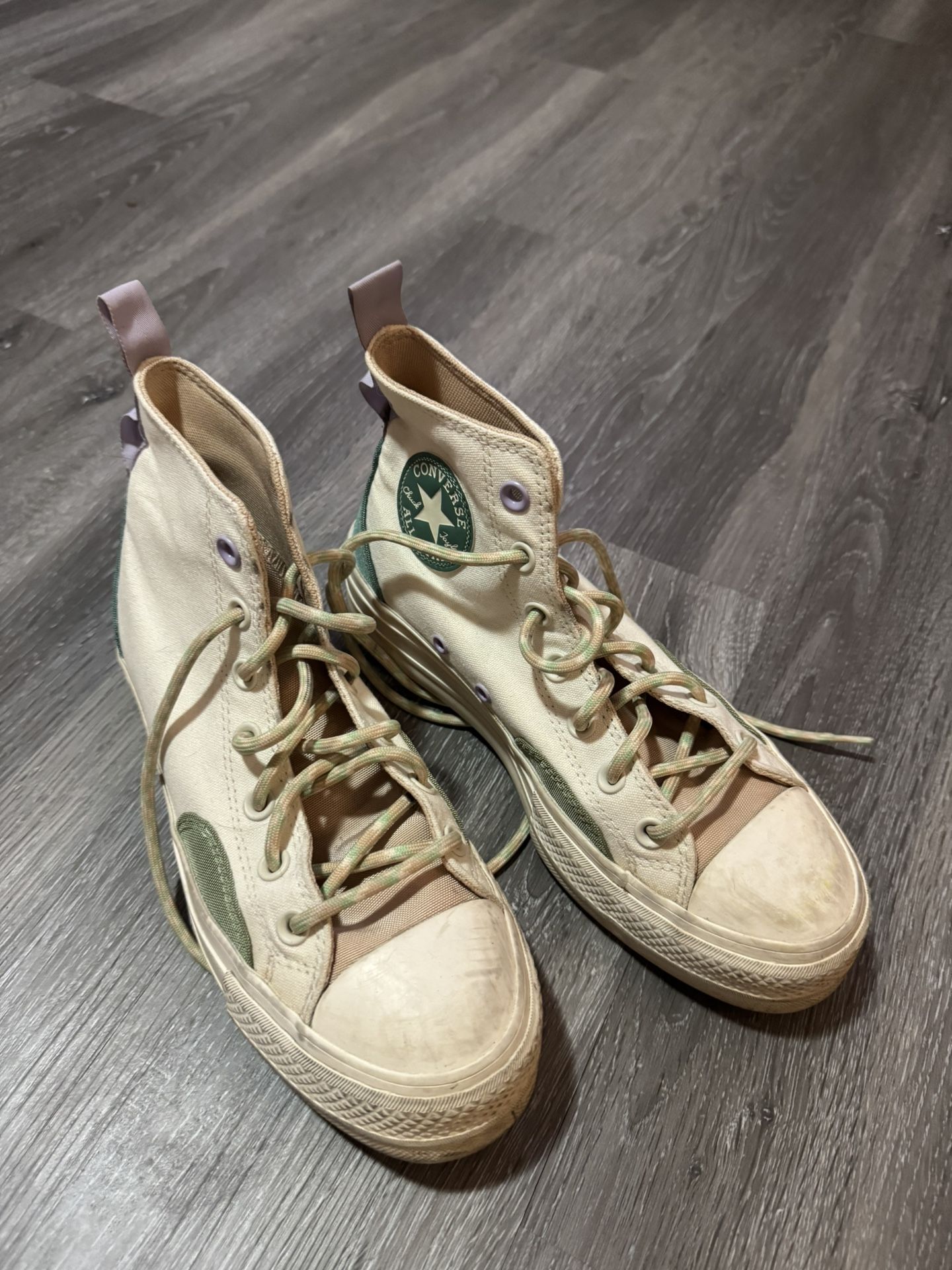 white and green platform converse