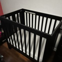 Mini Crib with mattress and bedding