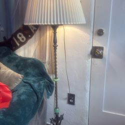 Antique brass floor lamp with glass jade colored accents