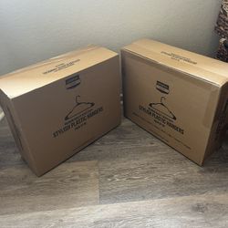 Pack of 50 clothes hanging hooks. Both for the same price. New in box