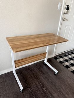  Height adjustable rolling desk