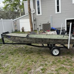 1436 Jon Boat, 9.9 Johnson And Trolling Motor